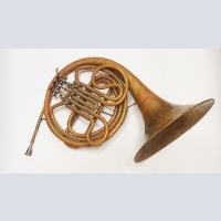 Horn. Wind musical instrument of the Soviet era. Antique gift shop.